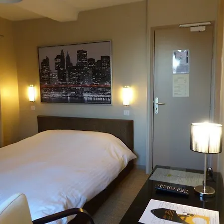 מלון L'auberge Du Cochon D'or