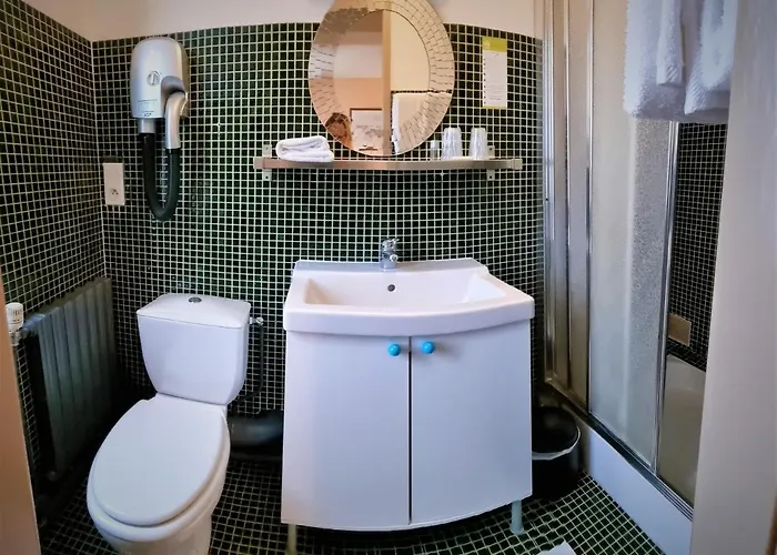 מלון L'auberge Du Cochon D'or